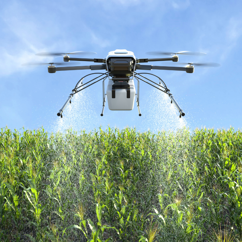 “Drone irrigating a crop field, showcasing modern agricultural technology and precision farming in agriculture